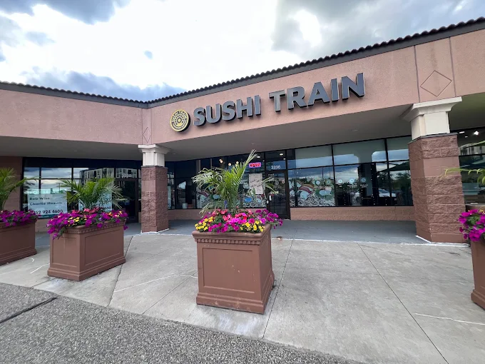 Sushi Train’s West Lake Street storefront and flower planters